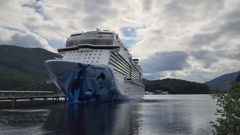 Norwegian-Bliss-cruise-ship-docked-in-Ketchikan-Alaska-showing-bow-of-ship-and-WyLAND-design