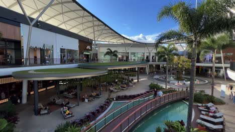 People-shopping-at-pacific-fairs-shopping-centre-at-Gold-Coast-on-a-relaxing-and-sunny-afternoon,-Queensland,-Australia