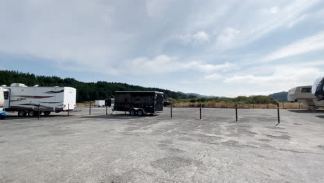 Different-campers,-trailers-and-Fifth-Wheels-parked-at-Gold-Beach-storage