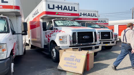 Male-customer-with-packing-boxes-at-U-Haul-truck-rental