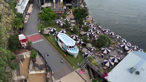 Top-down-view-overlooking-at-the-riverfront-precinct,-capturing-the-felons-howard-smith-wharves-venues-from-above,-waterfront-dining-and-bar-area