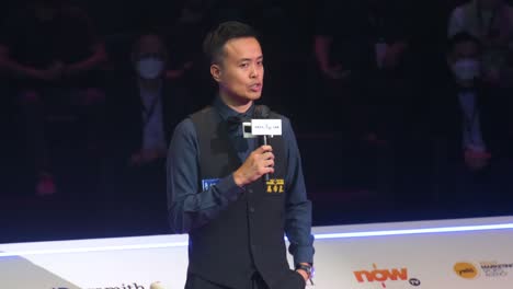 Professional-snooker-player-of-Hong-Kong,-Marco-Fu,-talks-after-losing-the-final-match-and-earning-second-place-at-the-Hong-Kong-Masters-snooker-tournament-event
