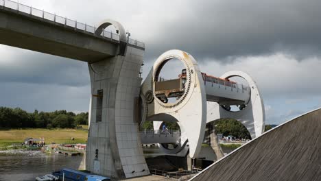 Time-lapse-of-Falkirk-Wheel-boat-lift-which-rotates-itself-in-Scotland-and-moves-the-red-ship-down