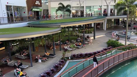 Shoppers-strolling-and-window-shopping-at-pacific-fairs-largest-shopping-centre-in-Gold-Coast-at-Broadbeach-Waters-on-a-relaxing-and-sunny-afternoon,-Queensland,-Australia