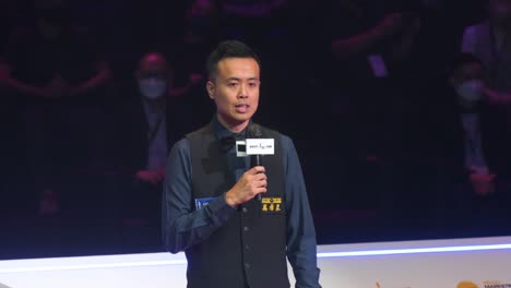 Professional-snooker-player-of-Hong-Kong,-Marco-Fu,-is-seen-talking-after-losing-the-final-match-and-earning-second-place-at-the-Hong-Kong-Masters-snooker-tournament-event