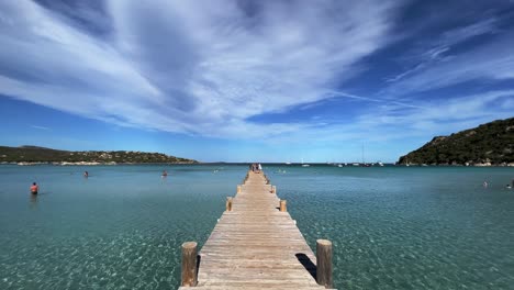 Santa-Giulia-beach-famous-wooden-pier-in-Corsica-island,-France