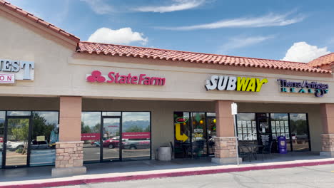 Various-businesses-and-stores-in-a-small-strip-mall-in-Arizona