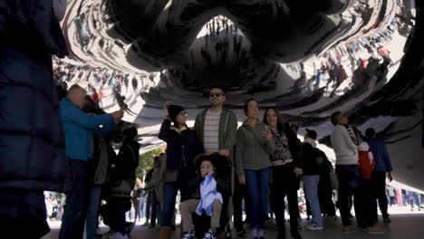 Slow-Motion-The-Chicago-Bean-Family-walking-by-with-Stroller-Happy