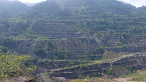 A-landscape-changed-by-the-impact-of-copper-and-gold-mining-at-infamous-Panguna-Mine-in-Bougainville,-Papua-new-Guinea