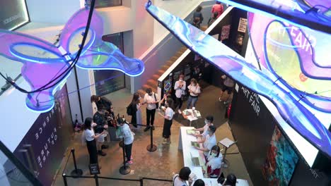 Chinese-visitors-and-attendees-are-seen-queuing-in-line-at-the-Digital-Art-Fair-Asia-showcasing-upcoming-trends-such-as-Web-3