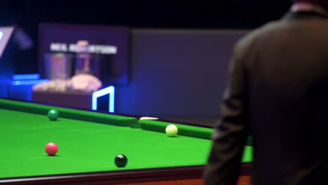 Neil-Robertson,-an-Australian-professional-snooker-player,-is-seen-in-action-as-he-strikes-a-ball-during-a-match-at-the-Hong-Kong-Masters-snooker-tournament-event