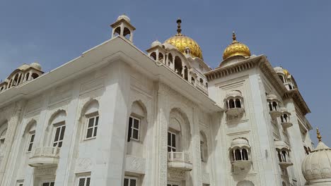 isolated-gurudwara-building-with-golden-dome-and-flat-sky-at-morning-from-different-angle-video-is-taken-at-gurudwara-bangla-sahib-delhi-india-on-May-22-2022