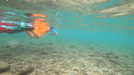 Hawaii-Vacation,-Father-Son-Snorkeling-In-Hanauma-Bay,-Oahu