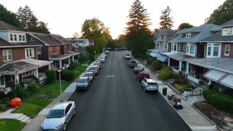 Traditional-American-homes-on-quiet-suburban-street-at-sunset
