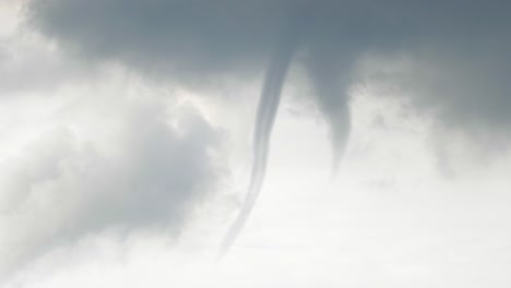 Waterspout-funnel-forming-in-the-sky