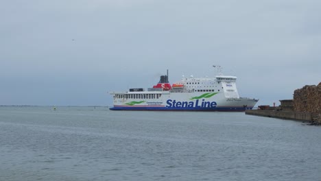 Big-ferry-ship-Stena-Line-arriving-at-Port-of-Liepaja-,-overcast-autumn-day,-wide-shot-from-a-distance