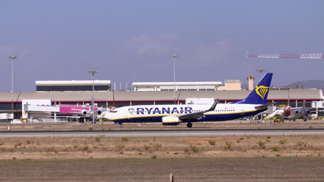 a-ryanair-boeing-737-plane-taxis-to-the-end-of-the-runway-for-takeoff