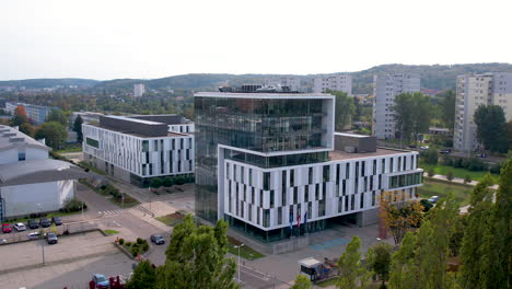 University-of-Gdansk-Poland,-Modern-Architectural-Building-of-Academic-and-Education-Institution-and-Neighborhood-Surroundings,-Aerial-View