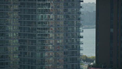 View-Looking-At-Silver-Towers-Facade-Beside-Hudson-River-During-The-Day