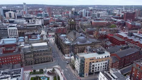 Aerial-Drone-Shot-Over-North-Leeds-City-Centre-with-Leeds-Town-Hall-in-Shot-on-Overcast-Day-in-Spring