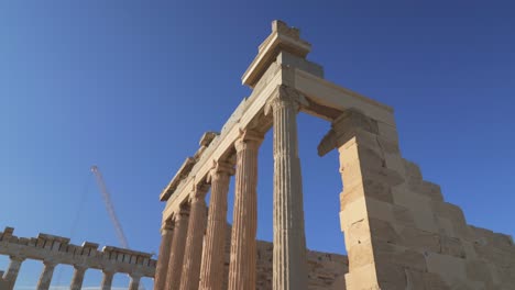 Marble-Colonnade-of-Pandroseion-with-Acropolis-in-Background