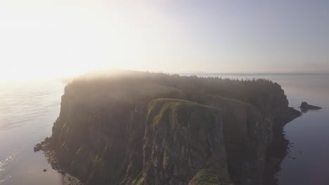 Morning-sunrise,-rolling-fog,-rocky-cliffs-and-flowing-tidal-waters-of-Cape-Split,-Nova-Scotia