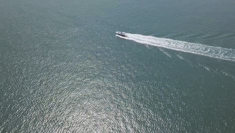 Boat-cruses-across-the-Frame.-Aerial-shot