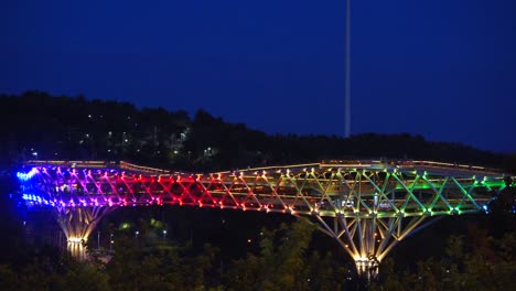 Tehran,-Iran-Night-Light-Bridge-panorama