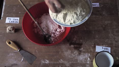 mix-water-and-flour-for-bread-cake-recipe-over-the-wood-with-labeled-ingredient-for-make-pizza-homemade