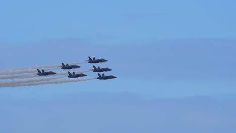 Tracking-Shot---Blue-Angels-Fly-By-Maneuver-in-a-Delta-Formation-at-an-Airshow-in-VA---During-National-Anthem