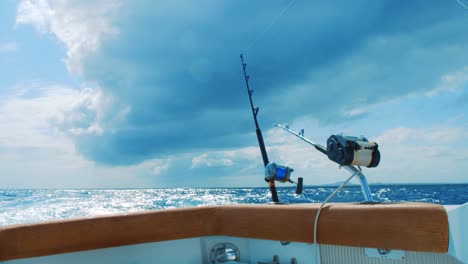 Fishing-rods-trolling-in-tumultuous-Caribbean-Sea-with-storm-clouds-gathering