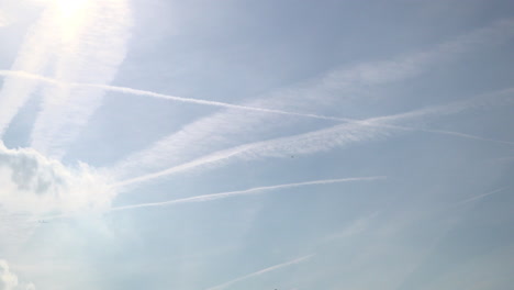 UK-October-2018---Time-lapse-of-aircraft-leaving-vapour-trails-as-they-pass-high-overhead-and-drift-through-an-early-morning-sky