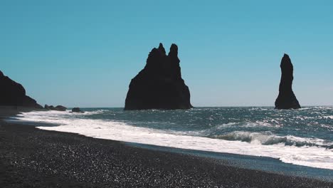 Great-shot-of-waves-hitting-the-black-sand-beach-in-south-iceland