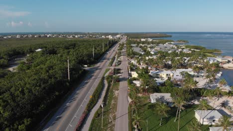 Florida-Keys,-Islamorada,-backward-aerial-flight-over-Overseas-Highway-to-Key-West
