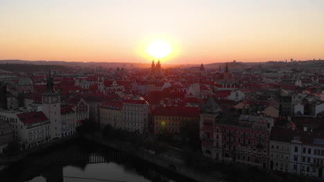 Aerial-view,-sunrise-with-the-city-in-background,-Prague,-Czech-Republic