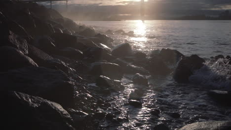 Morning-ocean-waves-splashes-rocks-on-Ambleside-beach-in-Vancouver