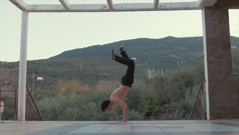 Handstand-fitness-press-to-bent-arm-planche-to-V-sit-4K-scenic-location