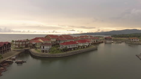 Dolly-in-Aerial-Footage-of-Old-Houses-in-Las-Casas-Filipinas-De-Acuzar