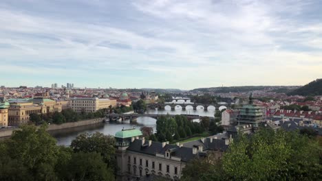 A-view-over-Prague-and-the-multiple-bridges-crossing-the-Vltava-River-on-a-clear-day