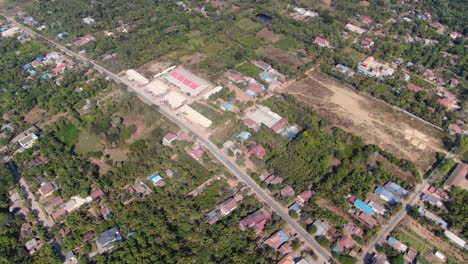 Aerial-clip-of-outlying-areas-along-Sangkae-River-in-Battambang-Cambodia-during-a-summer-day