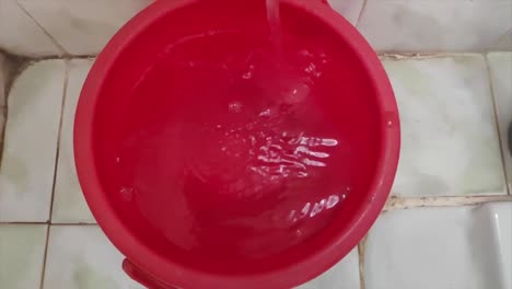 Slow-Motion-Video-of-water-falling-in-bucket