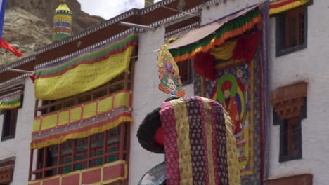 Monks-wearing-colorful-masks-and-dresses-at-Hemis-festival-in-monastery