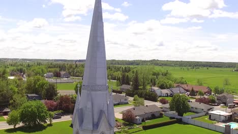Aerial-shot-rising-beside-Catholic-church-in-rural-Quebec-Canada