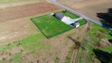 Amish-One-Room-School-House-with-Amish-Children-Playing-Baseball-as-Seen-by-a-Drone