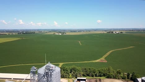 Aerial-grain-bins-on-farm-in-summer