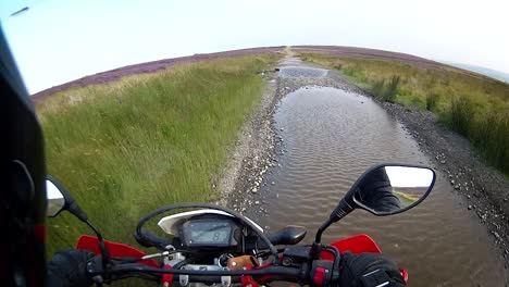 Helmet-camera-footage,-trail-bike-riding-off-road-on-the-North-York-Moors