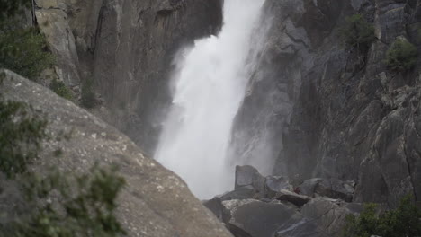 Closeup-slow-motion-shot-of-lower-Yosemite-falls-in-early-spring-snow-melt-runoff
