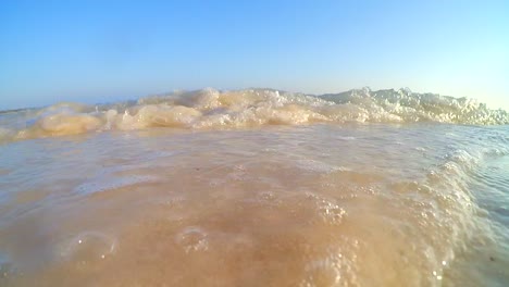 beach-footage-with-wave-come-to-the-camera