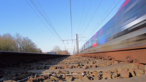A-high-speed-train-passing-by-on-the-next-train-track