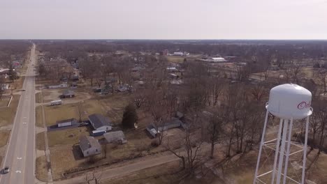 Aerial-footage-of-a-water-tower-in-the-small-southern-Illinois-town-of-Odin